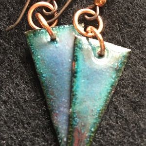 Points enameled blue, green and violet colored